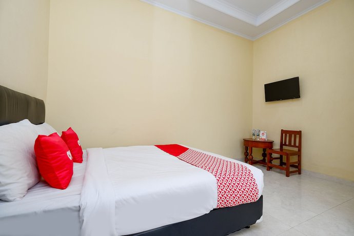 Imagen de la habitación del Hotel OYO 2058 Griya Ria. Foto 16