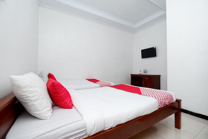 Imagen de la habitación del Hotel OYO 2058 Griya Ria. Foto 17