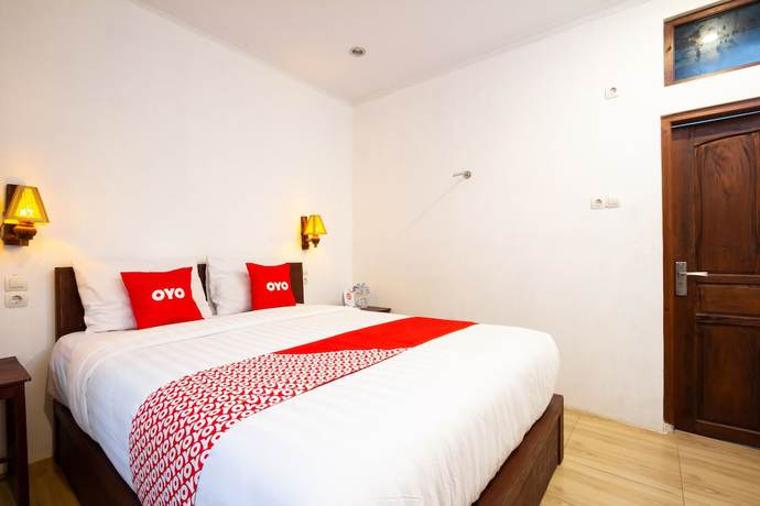 Imagen de la habitación del Hotel OYO 2068 Abhaya Mudra Homestay. Foto 6