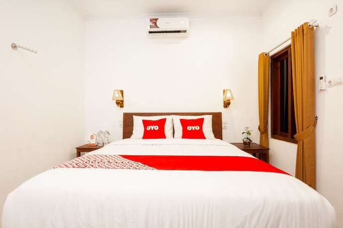 Imagen de la habitación del Hotel OYO 2068 Abhaya Mudra Homestay. Foto 9