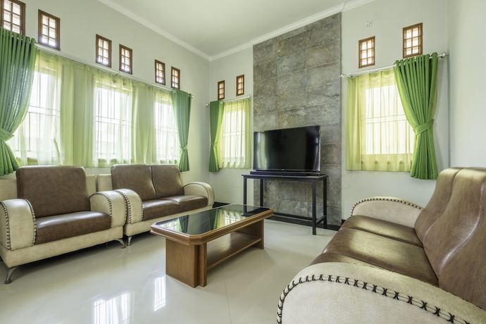 Imagen de los interiores del Hotel OYO 2072 Wisma Teratai. Foto 19