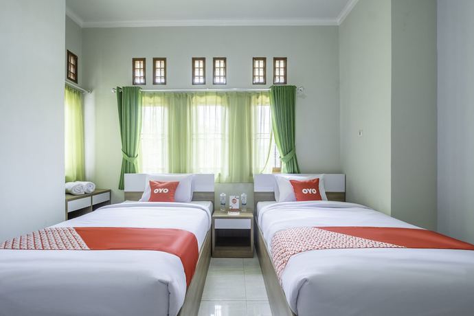 Imagen de la habitación del Hotel OYO 2072 Wisma Teratai. Foto 7