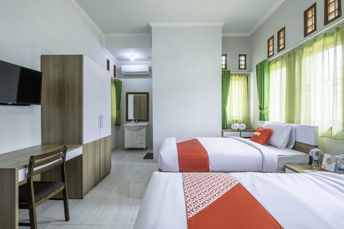 Imagen de la habitación del Hotel OYO 2072 Wisma Teratai. Foto 9