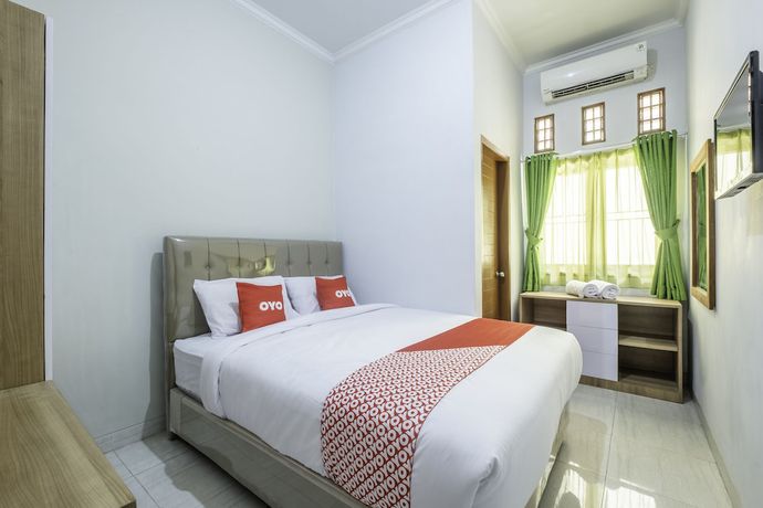 Imagen de la habitación del Hotel OYO 2072 Wisma Teratai. Foto 10