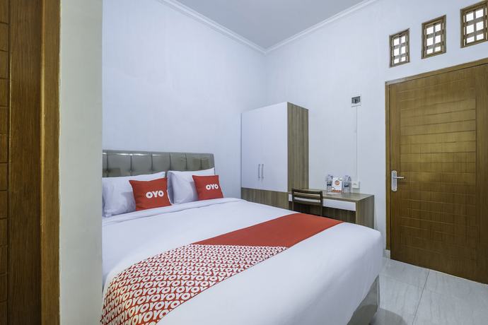 Imagen de la habitación del Hotel OYO 2072 Wisma Teratai. Foto 11