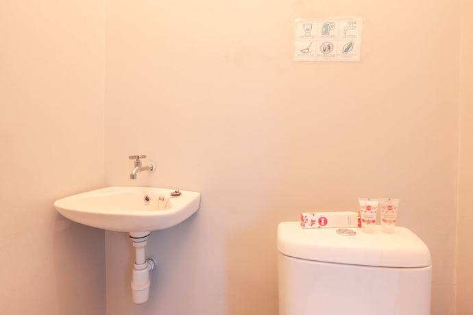 Imagen de la habitación del Hotel OYO 208 G house. Foto 5