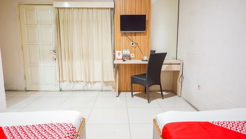 Imagen de la habitación del Hotel OYO 2085 Chrysanta. Foto 5