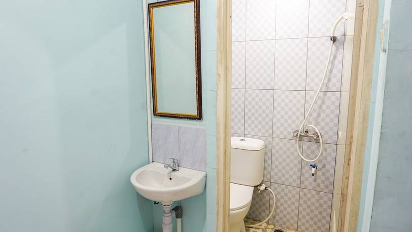 Imagen de la habitación del Hotel OYO 2088 Grha Blue Sky Syariah. Foto 10