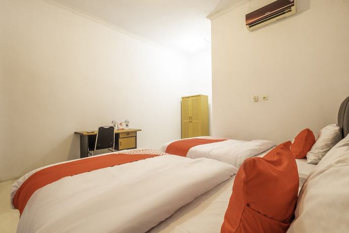 Imagen de la habitación del Hotel OYO 2121 Pondok Nazwa Syariah. Foto 8