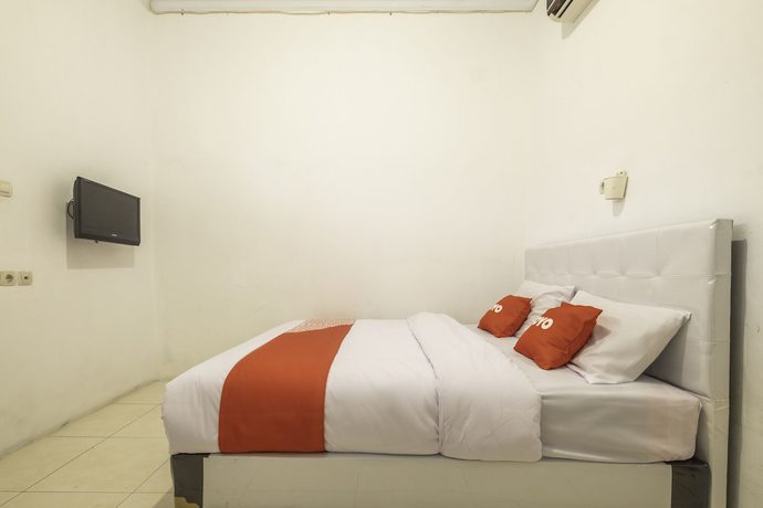 Imagen de la habitación del Hotel OYO 2121 Pondok Nazwa Syariah. Foto 10