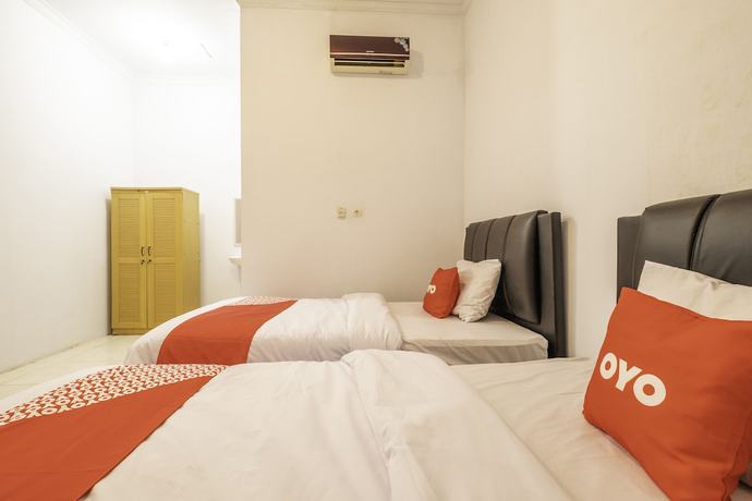 Imagen de la habitación del Hotel OYO 2121 Pondok Nazwa Syariah. Foto 11