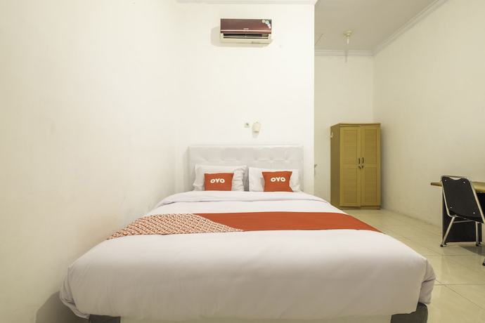 Imagen de la habitación del Hotel OYO 2121 Pondok Nazwa Syariah. Foto 12