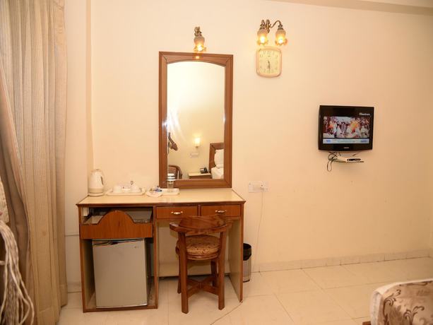 Imagen de la habitación del Hotel OYO 2152 Bahia Fort. Foto 2