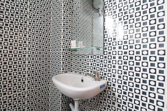 Imagen de la habitación del Hotel OYO 2176 Amanah Syariah Residence. Foto 7