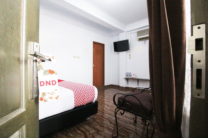 Imagen de la habitación del Hotel OYO 2176 Amanah Syariah Residence. Foto 12