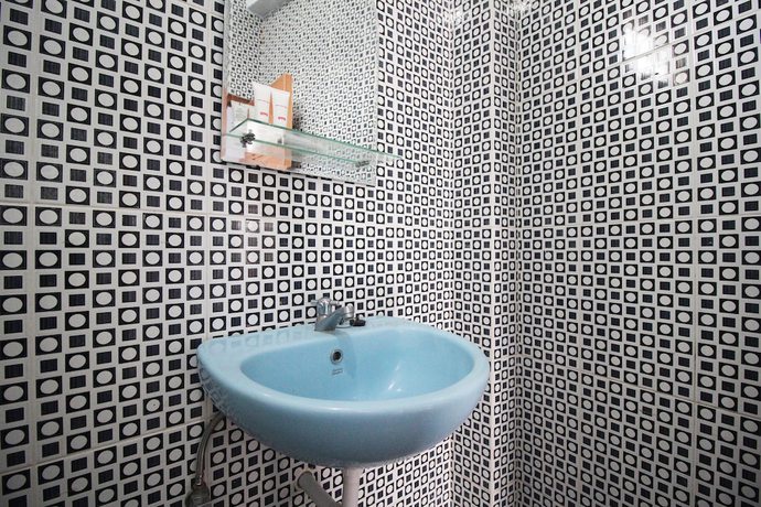 Imagen de la habitación del Hotel OYO 2176 Amanah Syariah Residence. Foto 16