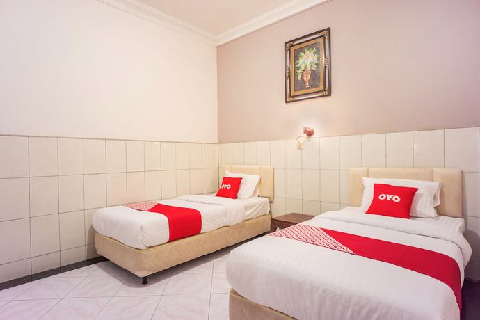 Imagen de la habitación del Hotel OYO 2180 Vina Vira. Foto 11