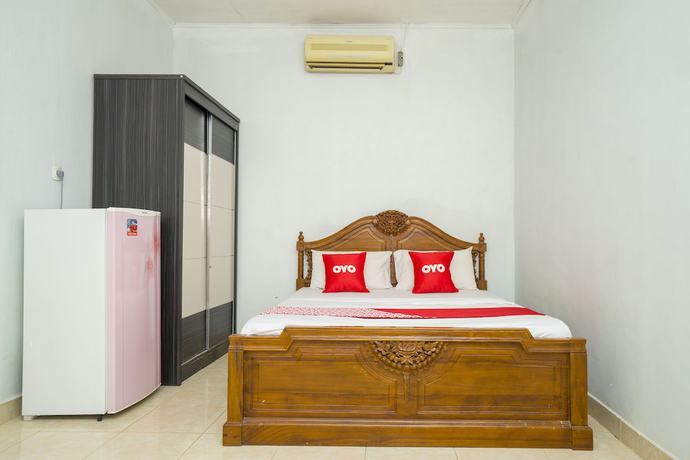 Imagen de la habitación del Hotel OYO 2181 Grand Yuda. Foto 5