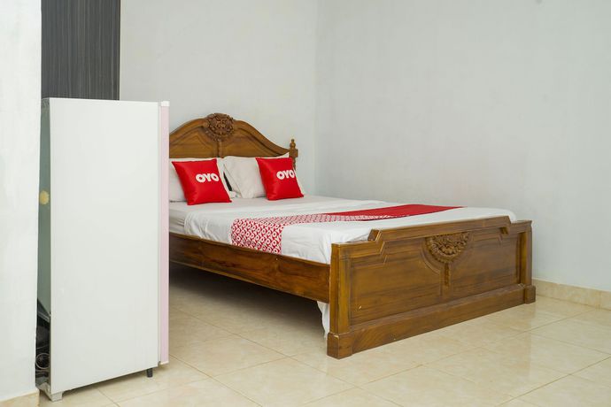 Imagen de la habitación del Hotel OYO 2181 Grand Yuda. Foto 9