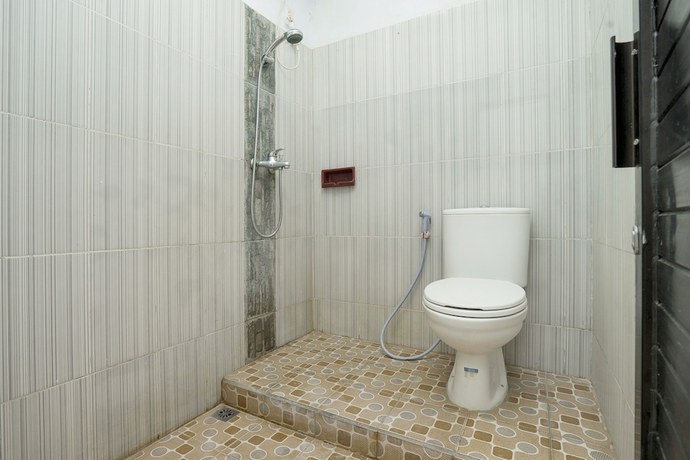 Imagen de la habitación del Hotel OYO 2181 Grand Yuda. Foto 10