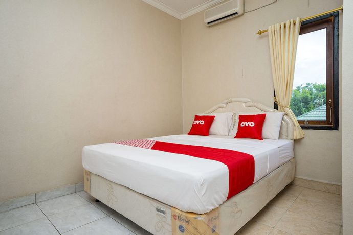 Imagen de la habitación del Hotel OYO 2181 Grand Yuda. Foto 11