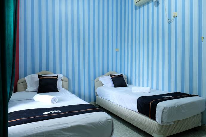 Imagen de la habitación del Hotel OYO 2186 Esbe Syariah. Foto 2