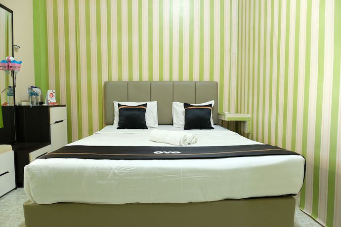 Imagen de la habitación del Hotel OYO 2186 Esbe Syariah. Foto 3
