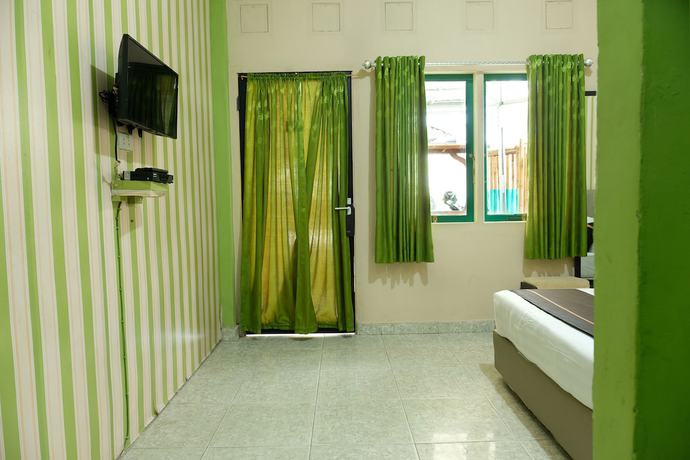 Imagen de la habitación del Hotel OYO 2186 Esbe Syariah. Foto 4