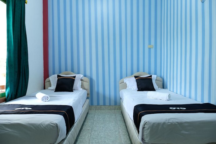 Imagen de la habitación del Hotel OYO 2186 Esbe Syariah. Foto 13