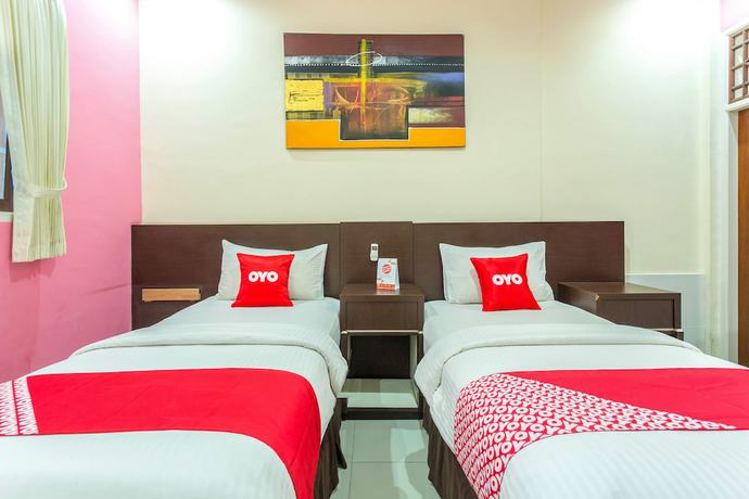 Imagen de la habitación del Hotel OYO 2191 Ganisfa. Foto 11