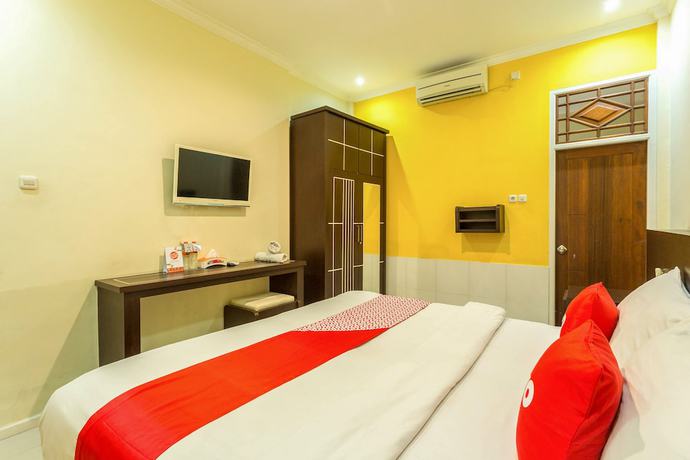Imagen de la habitación del Hotel OYO 2191 Ganisfa. Foto 14