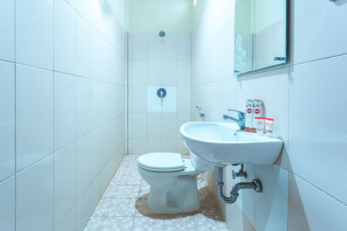 Imagen de la habitación del Hotel OYO 2191 Ganisfa. Foto 15