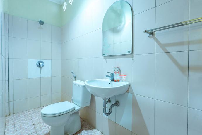 Imagen de la habitación del Hotel OYO 2191 Ganisfa. Foto 16