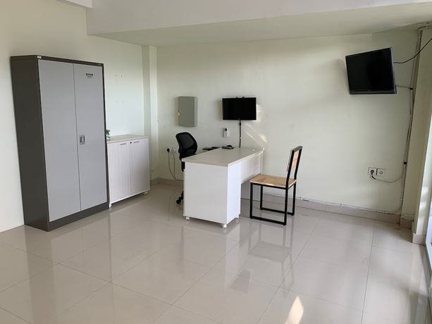 Imagen de los interiores del Hotel OYO 2203 Wira Residence. Foto 13
