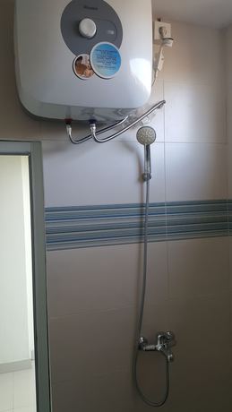 Imagen de la habitación del Hotel OYO 2203 Wira Residence. Foto 2