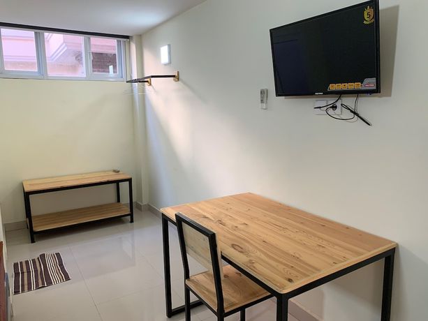 Imagen de la habitación del Hotel OYO 2203 Wira Residence. Foto 4