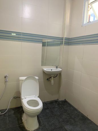 Imagen de la habitación del Hotel OYO 2203 Wira Residence. Foto 10