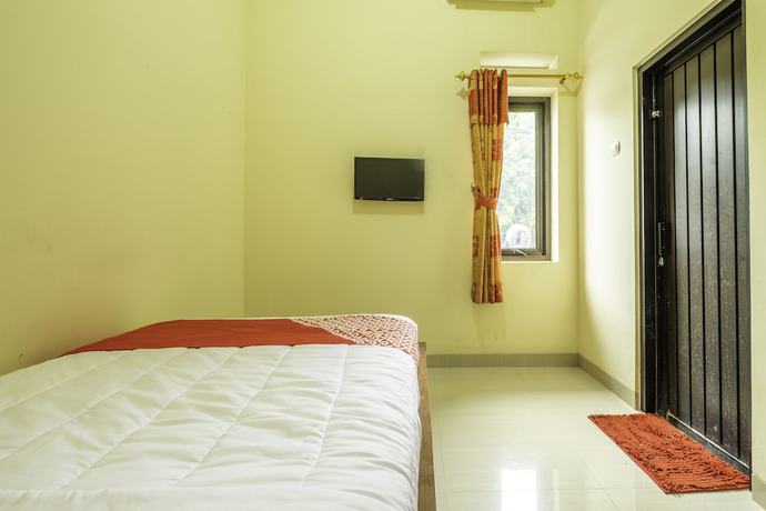 Imagen de la habitación del Hotel OYO 2260 Zleepy Sasana Budaya. Foto 9