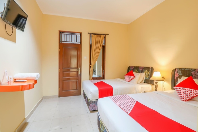 Imagen de la habitación del Hotel OYO 2280 Wisma Guntur II. Foto 3