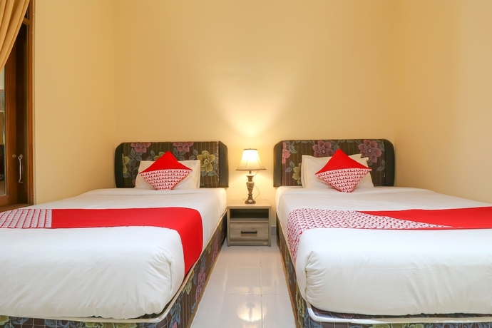 Imagen de la habitación del Hotel OYO 2280 Wisma Guntur II. Foto 7