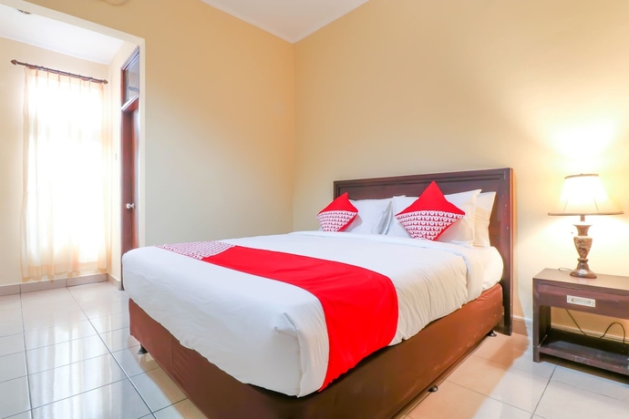 Imagen de la habitación del Hotel OYO 2280 Wisma Guntur II. Foto 8
