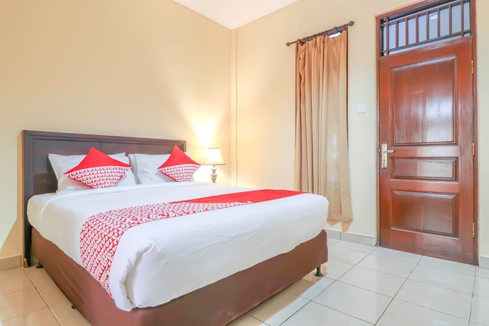 Imagen de la habitación del Hotel OYO 2280 Wisma Guntur II. Foto 9