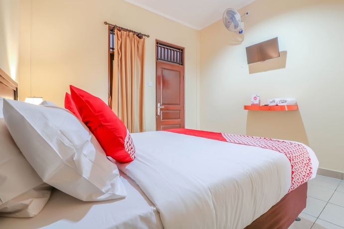 Imagen de la habitación del Hotel OYO 2280 Wisma Guntur II. Foto 10