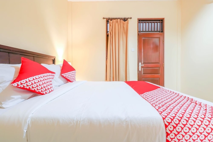 Imagen de la habitación del Hotel OYO 2280 Wisma Guntur II. Foto 11
