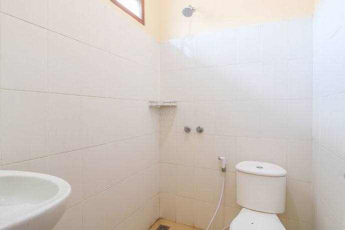 Imagen de la habitación del Hotel OYO 2280 Wisma Guntur II. Foto 14