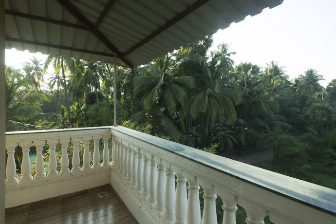 Imagen de la habitación del Hotel OYO 22919 Blue Roof Sea Side. Foto 4