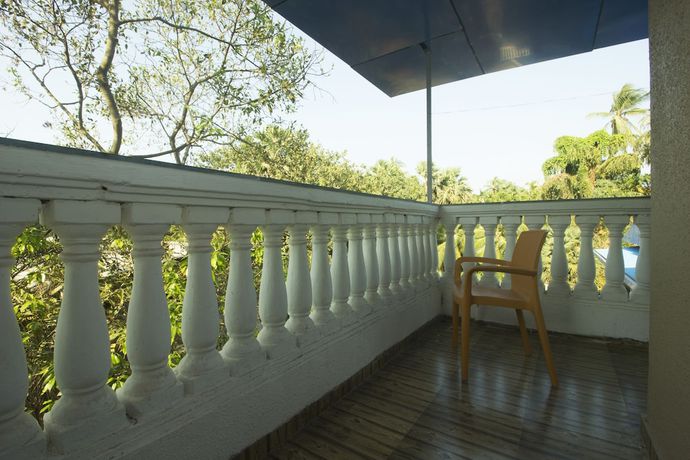 Imagen de la habitación del Hotel OYO 22919 Blue Roof Sea Side. Foto 9