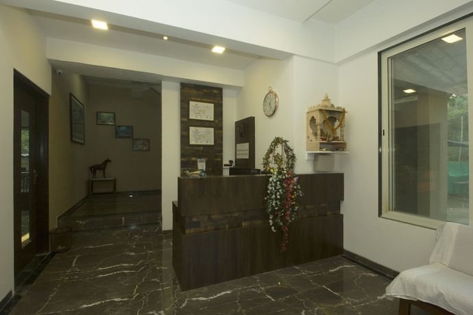 Imagen de los interiores del Hotel OYO 22919 Blue Roof Sea Side. Foto 19