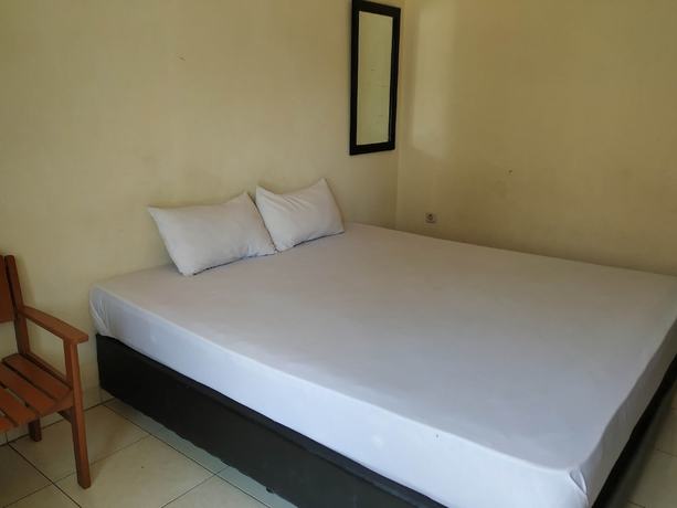Imagen de la habitación del Hotel OYO 2293 Lulu Homestay. Foto 7