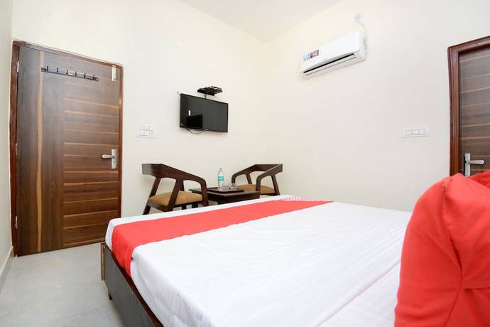 Imagen de la habitación del Hotel OYO 22993 Ozas Grand. Foto 6